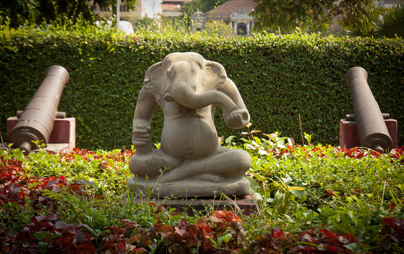 Ganesh is depicted with an elephant's head on a human body and in the Hindu tradition he is the son of Lord Siva and the Goddess Parvati. He is known as the Remover of Obstacles and is prayed to parti